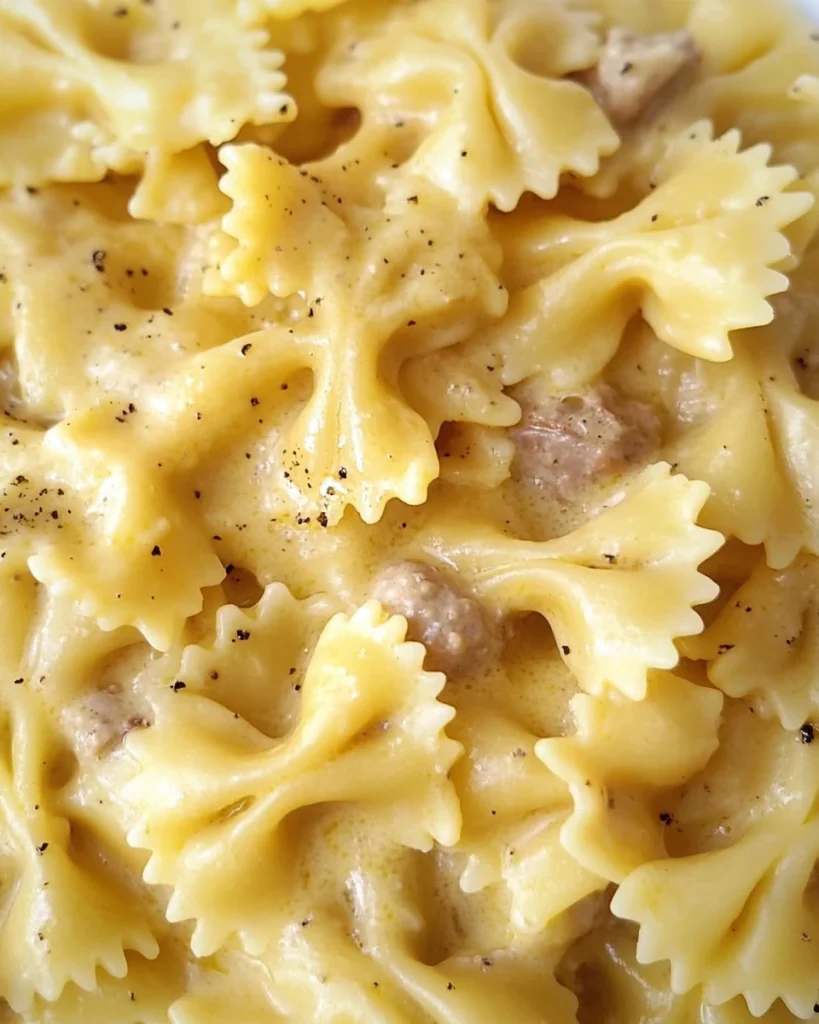 Farfalle Salsiccia with cream and saffron sauce