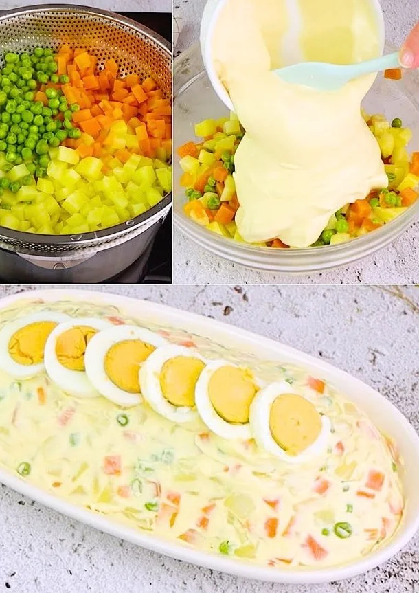 Insalata russa colorata con verdure e maionese in un piatto elegante.